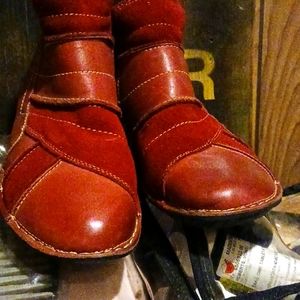 Burgundy leather and suede boots